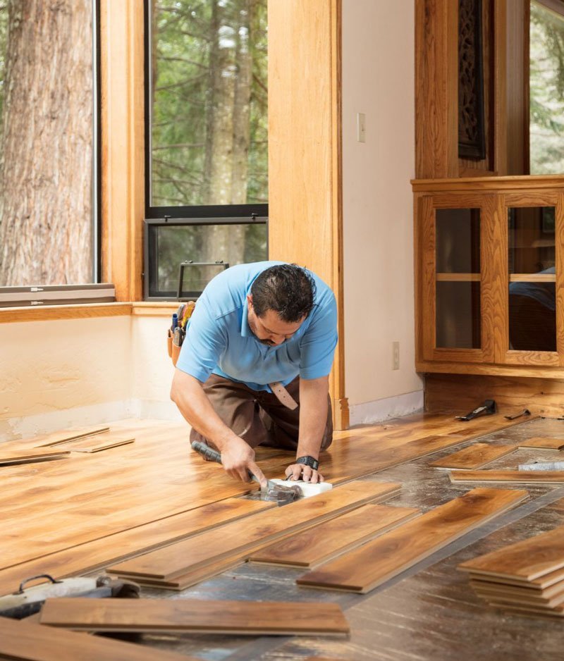 Danmark Flooring's expert installing hardwood floors